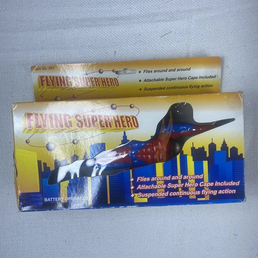 Flying Super Hero Action Figure Toy Battery Operated Cape Included Spins In Air